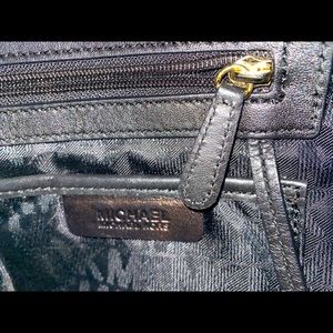 Michael Kors black leather handbag ,in great condition with metal-leather strap